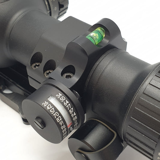 Shot angle compensator with ring and bubble level